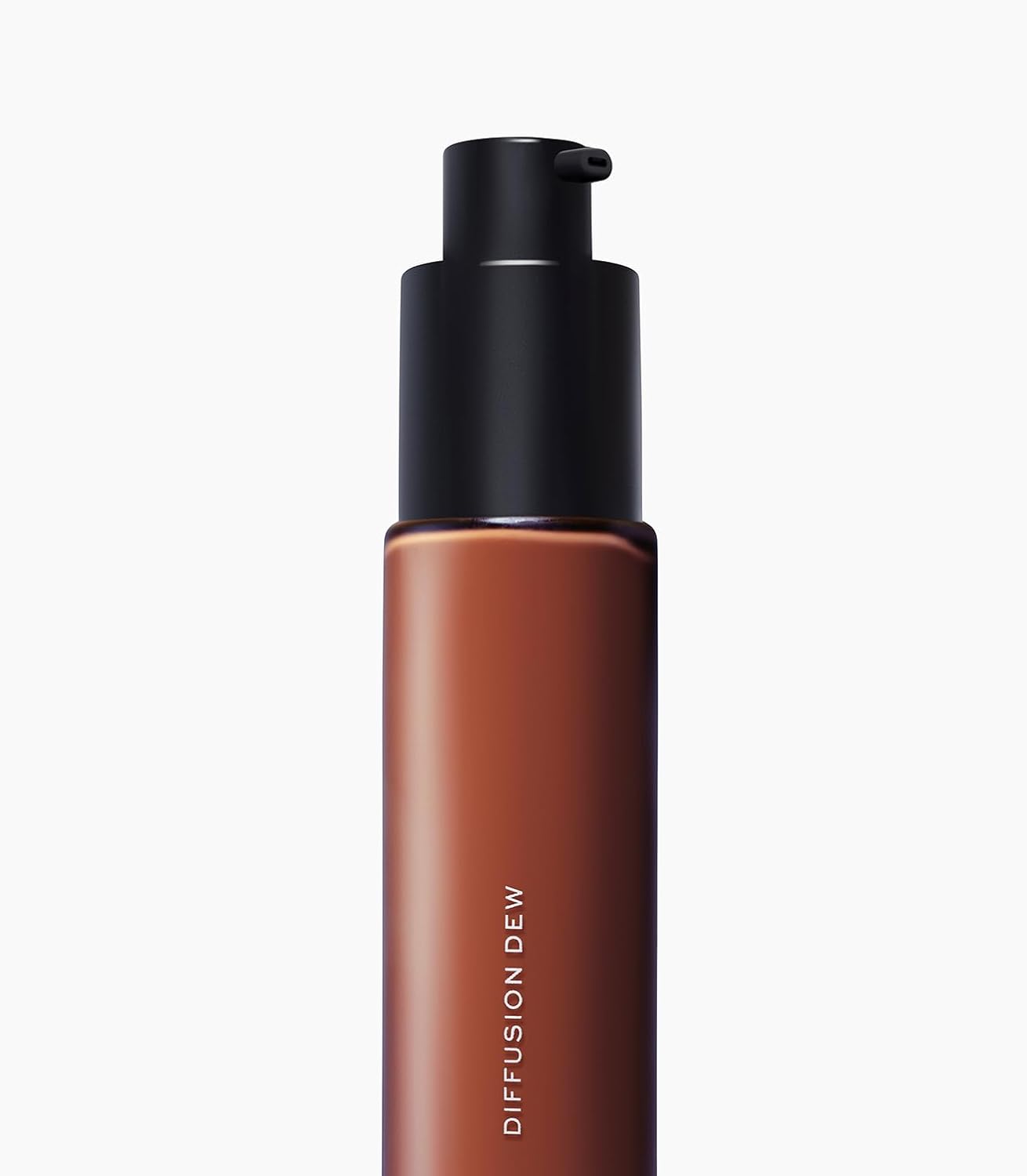 MAKE Beauty Diffusion Dew Skin Tint. Sheer to Medium Coverage Radiant Finish. Blurring, Smoothing, and Brightening for Glowing Complexion. Enhanced with Niacinamide and Adenosine. Rich Cocoa 18