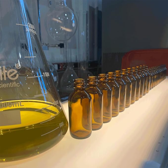 Pharoah - 100% Pure Moringa Oil blended with Leather, and Sweet Tobacco Essential oils and infused with Egyptian Ormus Gold - Pure Moringa Seed oil - Scent of The Nile - 2oz. (60 Ml)