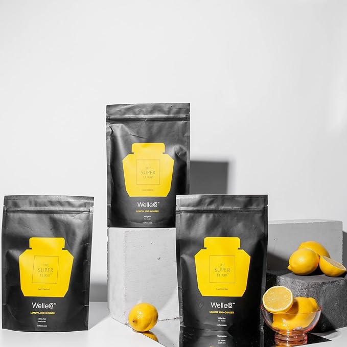 WelleCo The Super Elixir Daily Greens Powder, Probiotic Drink Mix with Whole Foods, Gluten Free, Vegan Gut Health Powder, Energy, Immunity, Healthy Skin, Hair & Nails (300g, Lemon Ginger)